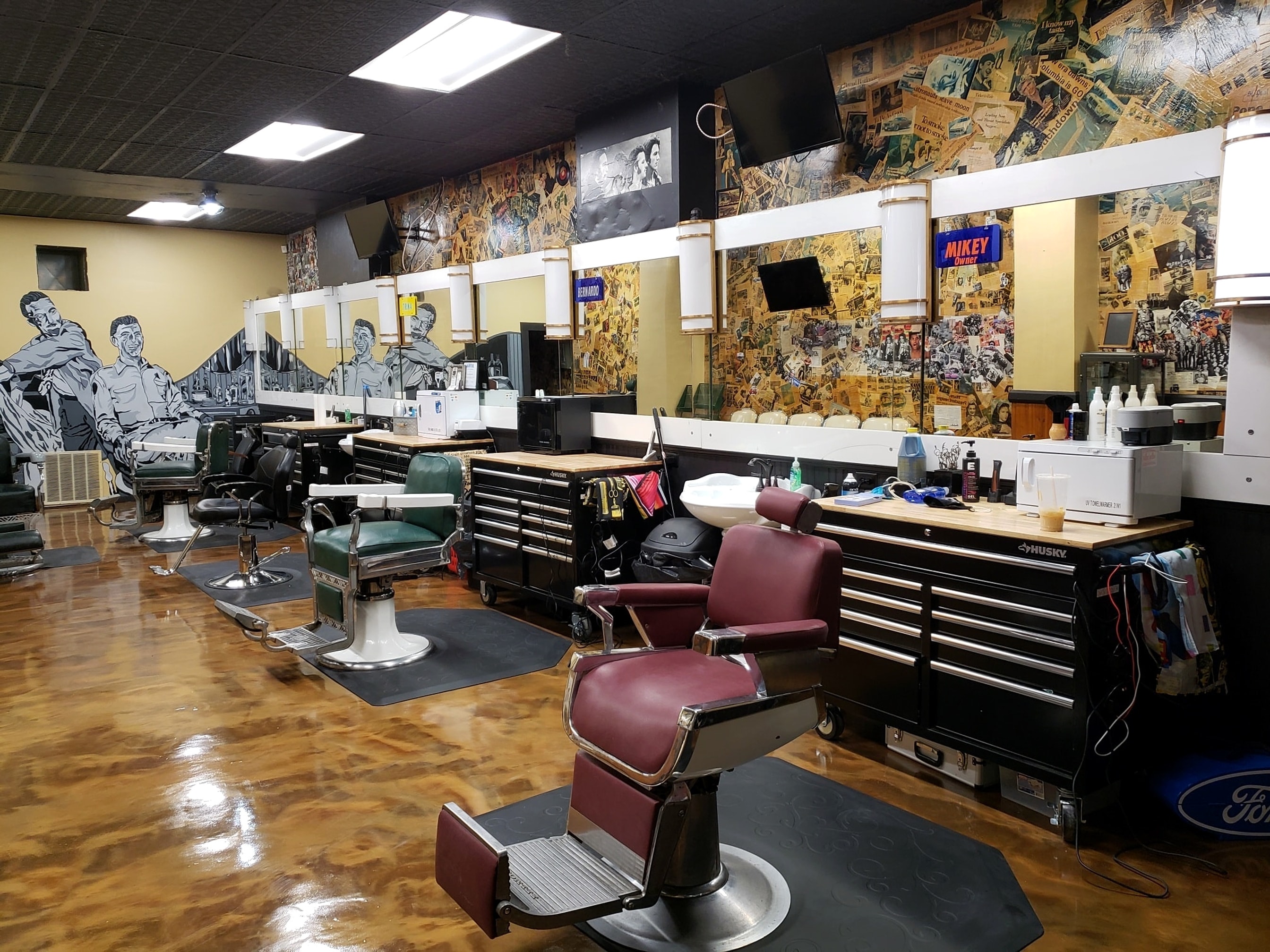 Vintage barber chairs and workstations inside Skyland Barber Shop